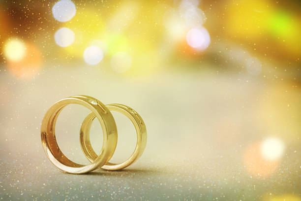 istock Two golden wedding rings 530567326