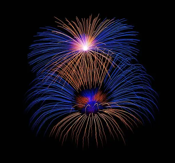 Photo of Blue and violet colorful fireworks in black,artistic fireworks