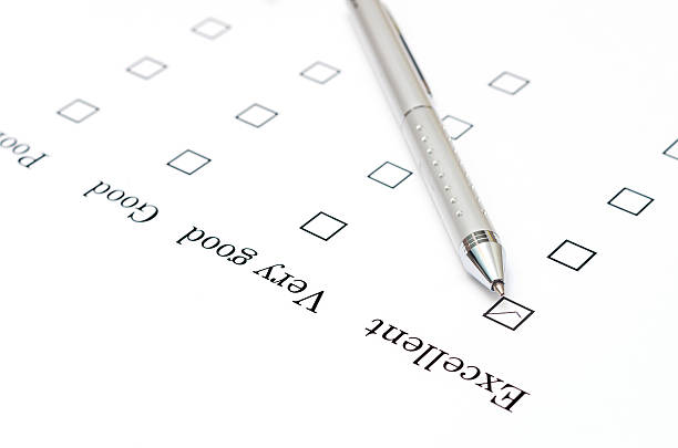 istock Mark Excellent with pen on survey paper document 530568157