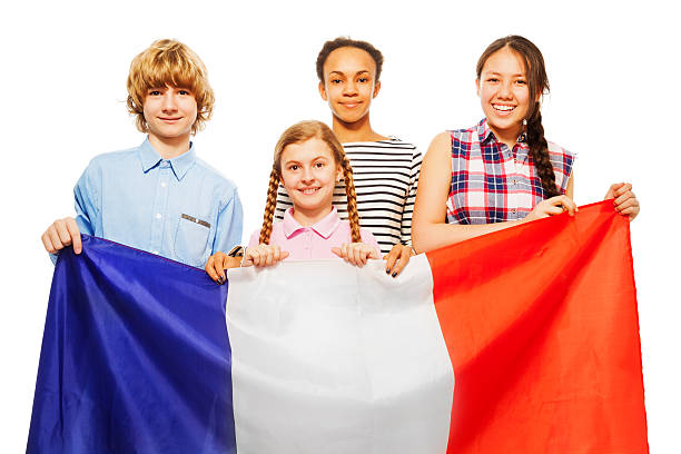 Four happy multiethnic students from France