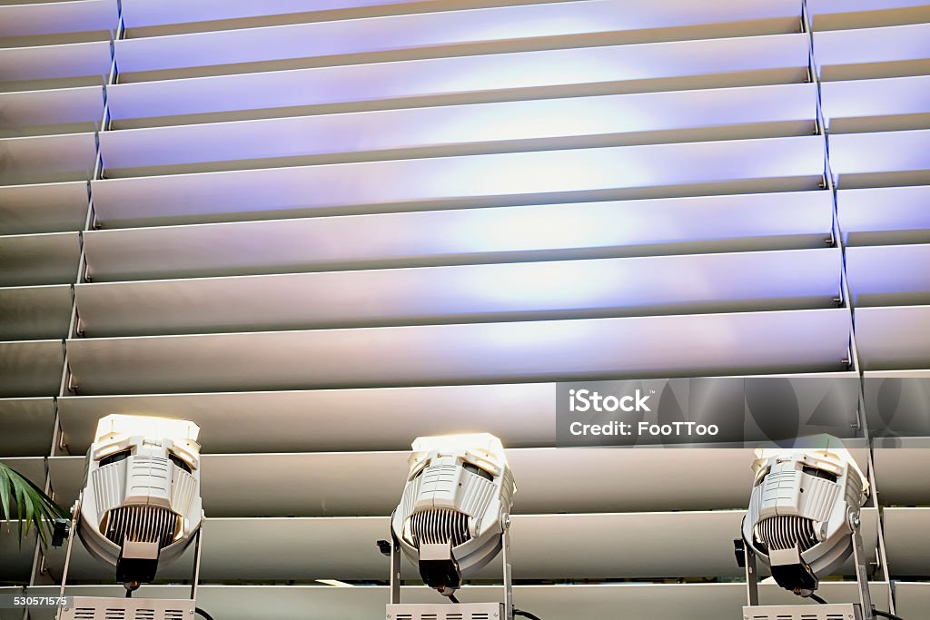 spotlight spotlight at a jalousie - nice background Silver Colored Stock Photo