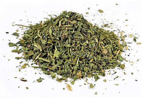 istock Heap of dried parsley on a white 530572695