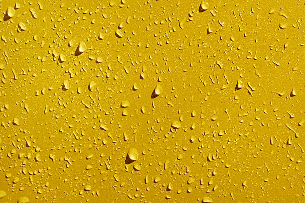 istock Yellow water drops for abstract and background 530574012