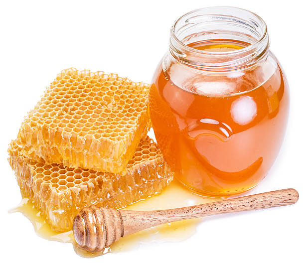 istock Jar full of fresh honey and honeycombs. 530574686