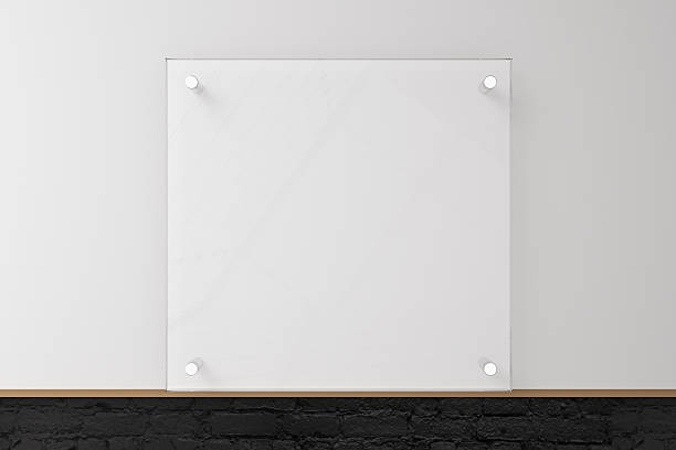 istock Glass plate on concrete wall 530576400
