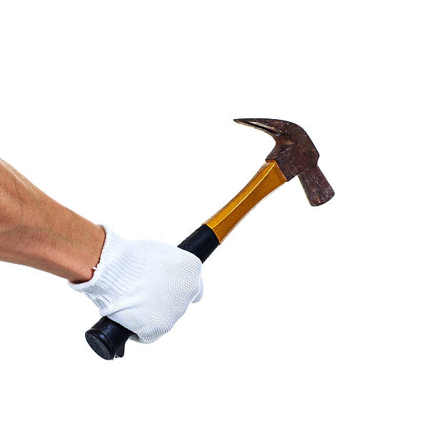 istock Worker holding hammer for fixing isolated on white 530579745