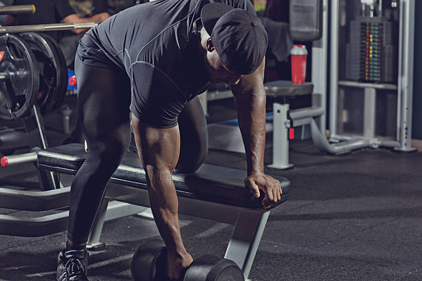 istock black athlete working out at a gym 530579948