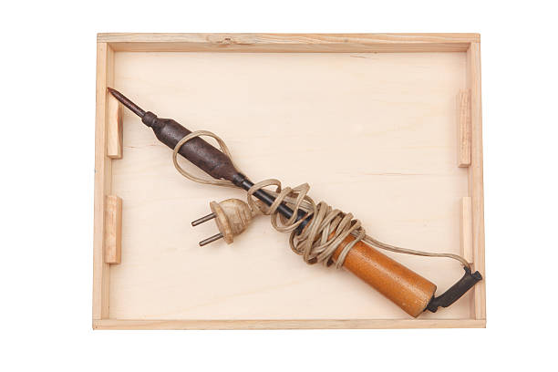 istock Soldering iron in a wooden box 530580469
