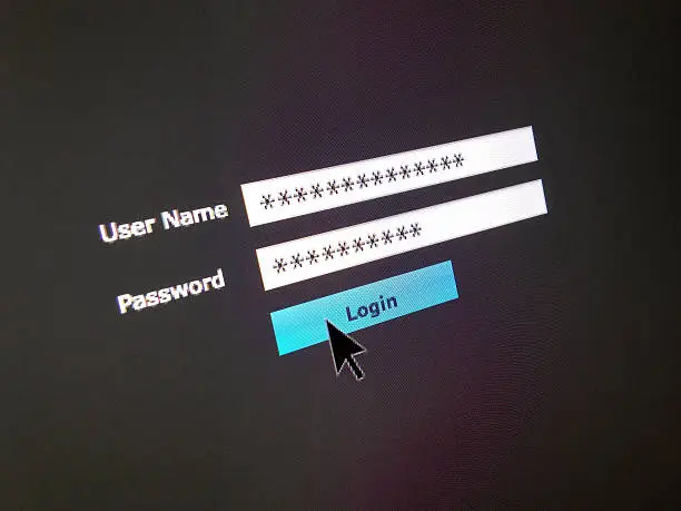 Closeup of a login process on a computer screen. Shot with an iPhone 4s.