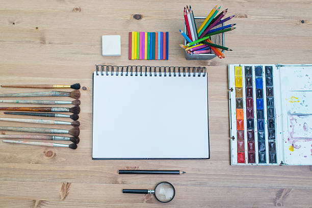 istock Workplace artist top view. Paint, brushes spread 530583336