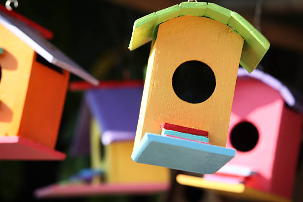 istock colorful bird house. 530583861