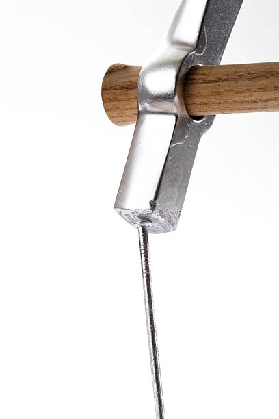 istock Hammer and nail, close-up 530584337
