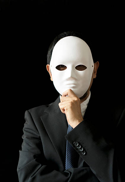 istock office man wearing mask in black backgrounds 530584416