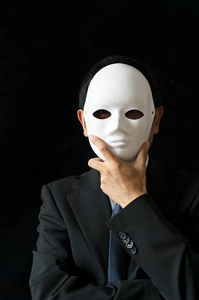 istock office man wearing mask in black backgrounds 530584876