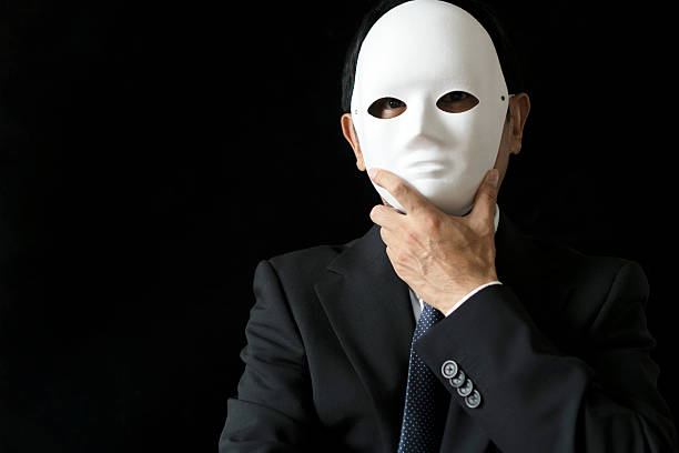 istock office man wearing mask in black backgrounds 530585444