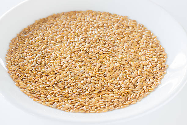 istock Organic gold flax seeds on a plate 530585565