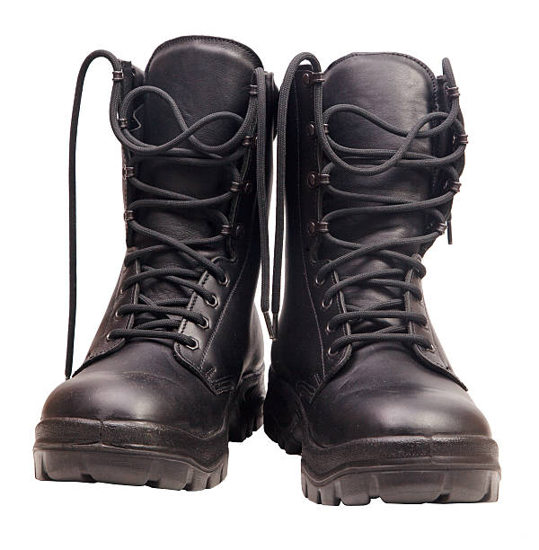 istock Black boots isolated on a white background 530586297