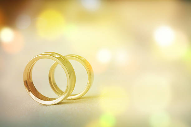 istock Two golden wedding rings 530587122