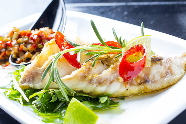 istock baked fish with rosemary and spices 530587182