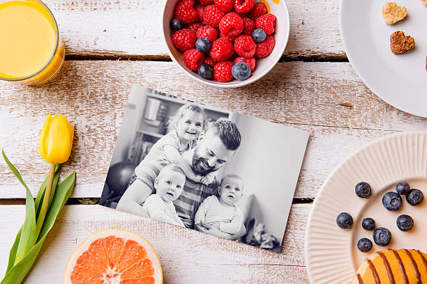 Fathers day composition. Black-and-white picture and breakfast