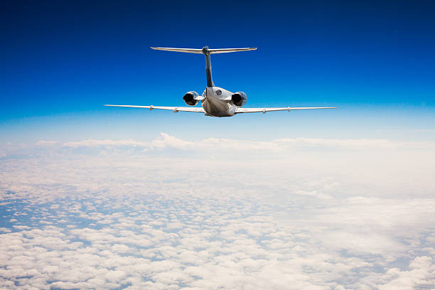 istock Flying an airplane in the sky 530588422