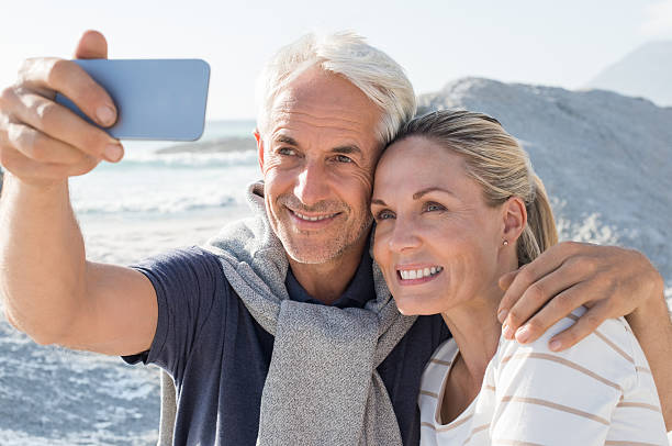 istock Senior Couple taking selfie 530589382