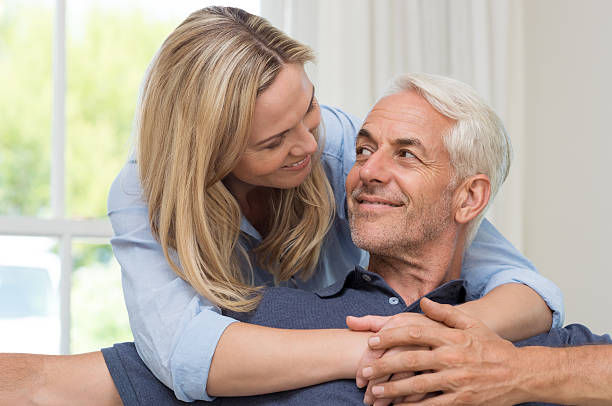 istock Senior couple embracing 530589740