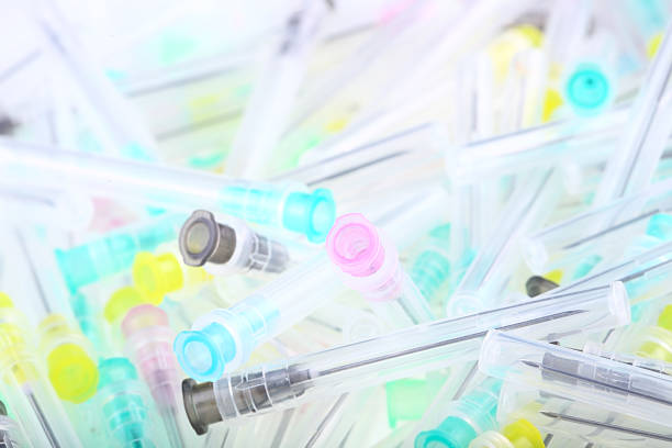istock Background from multicolored medical needles. 530591693