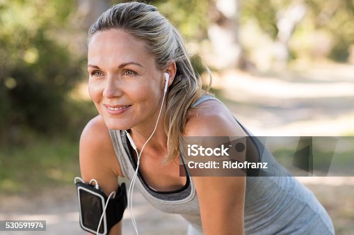 istock Mature woman jogging 530591974