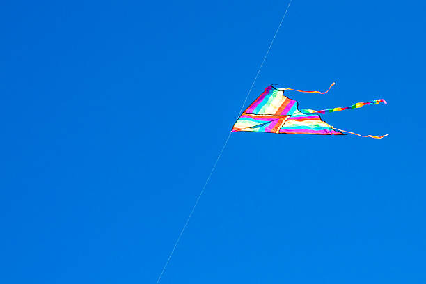istock kite in the blue sky 530592179