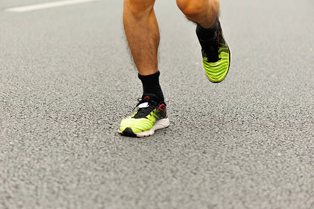 istock marathon runner athlete running on city road 530594951