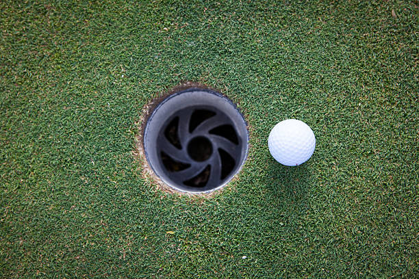 istock Golf ball just short of hole 530606987