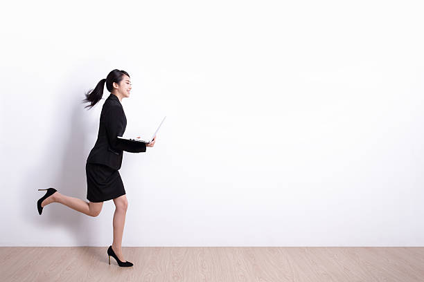 istock business woman run 530608553