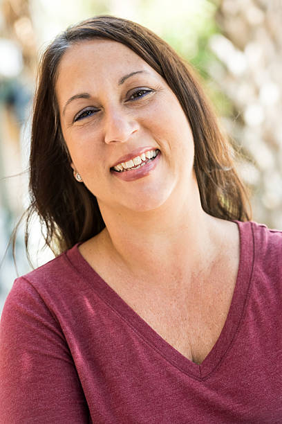 istock Smiling mature hispanic woman 530612735