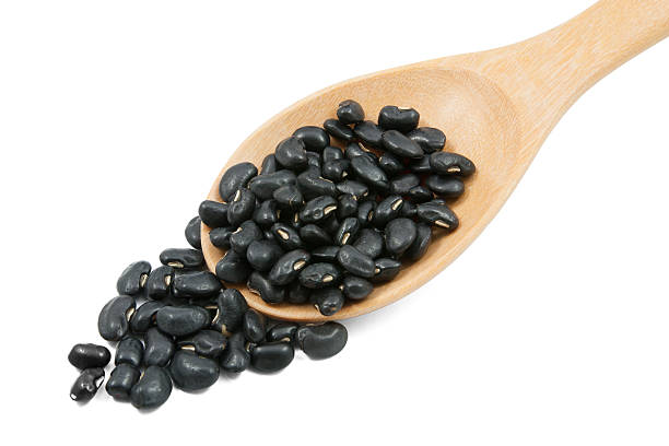 istock Black Beans on spoon wood 530612803