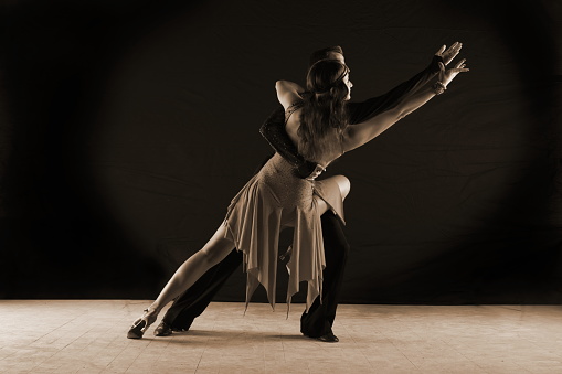 Latino dancers in ballroom