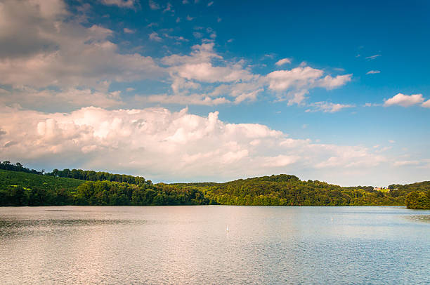 istock Evening clouds over hills and Lake Williams, in York, Pennsylvan 530616577