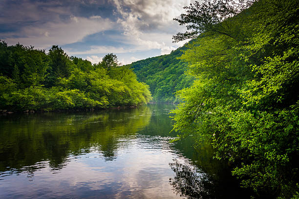 Evening clouds reflections in the Lehigh River, at Lehigh Gorge stock photo