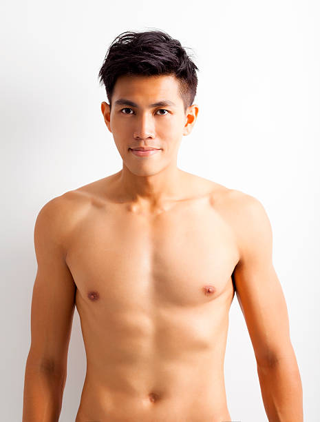 istock smiling shirtless muscular young asian man 530619243