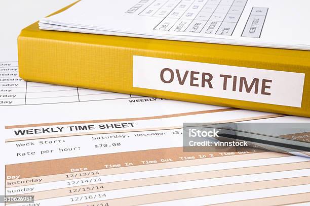 Working Overtime Stock Photo - Download Image Now - Wages, Working Late, Time Card