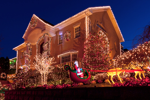 New York,  NY, USA - December 26, 2014: Luxury Home with Christmas Lights in Bay Ridge neighbourhood of Brooklyn, New York. The image taken at sunset. Wide angle lens.