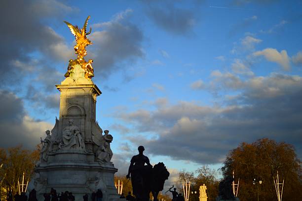 Victoria Monument (golden statue) outside Buckingham Palace in, City of Westminster, London.