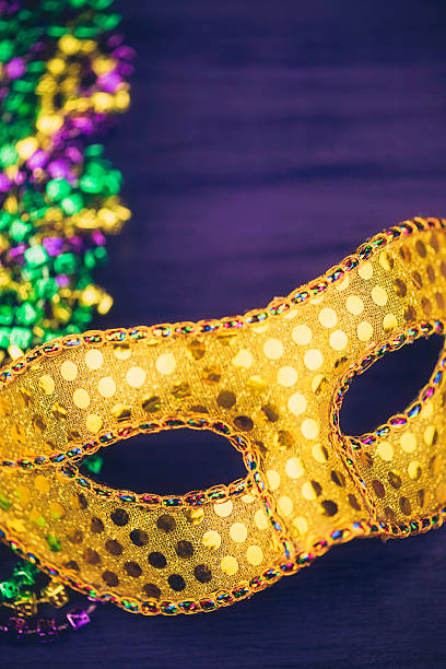 istock Mardi Gras background with mask 530629275