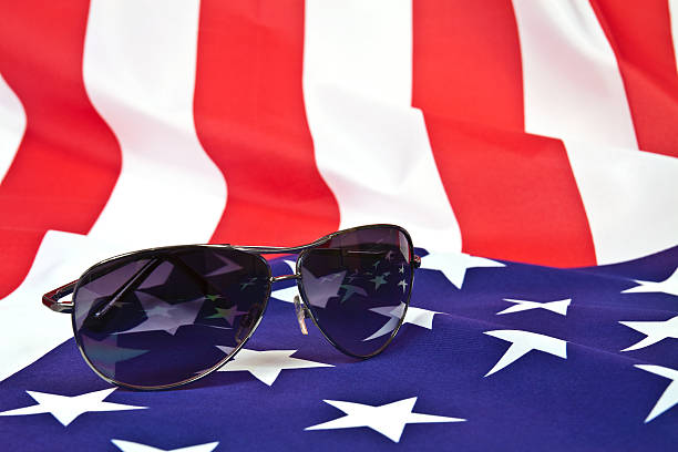 istock Sunglasses and American flag 530631429