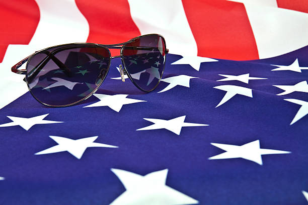 istock Sunglasses and American flag 530631431