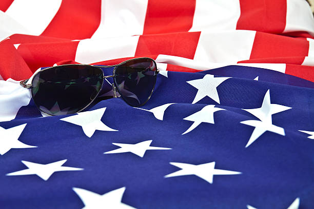 istock Sunglasses and American flag 530631437