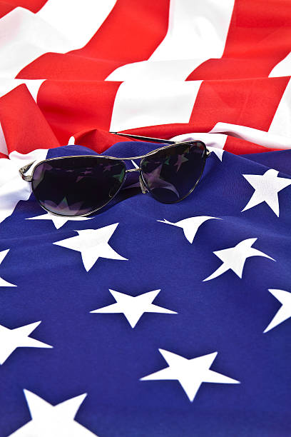 istock Sunglasses and American flag 530631439