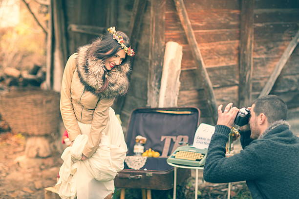 istock Groom photographing his bride on their wedding day 530635527