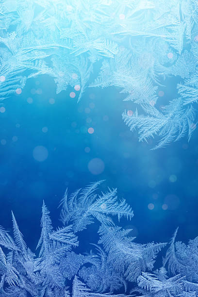 istock Winter night behind frozen window glass 530635611