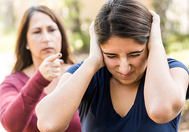 istock mother scolding her daughter 530640325